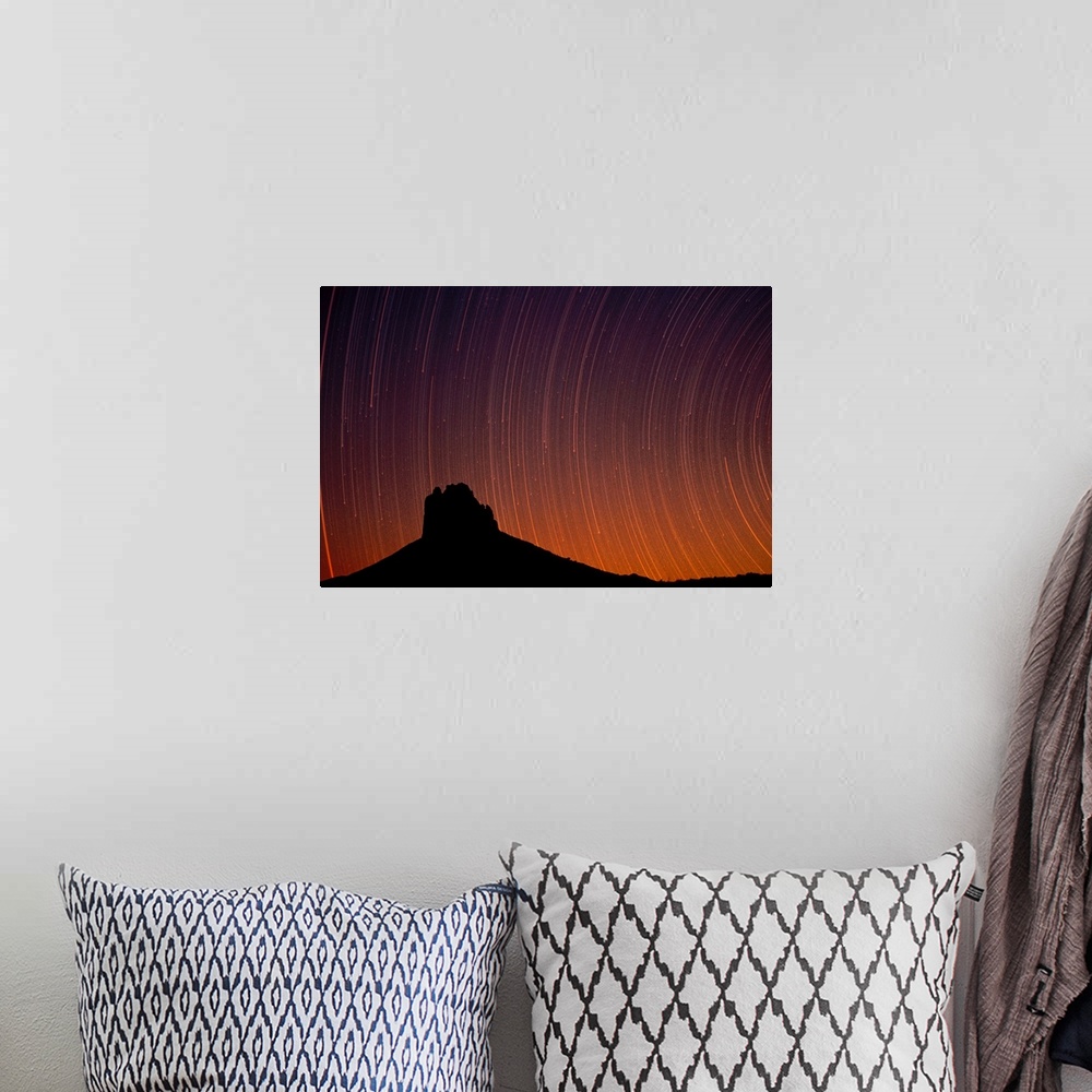 A bohemian room featuring Startrails over Shiprock in the four corners region of the Southwest, New Mexico