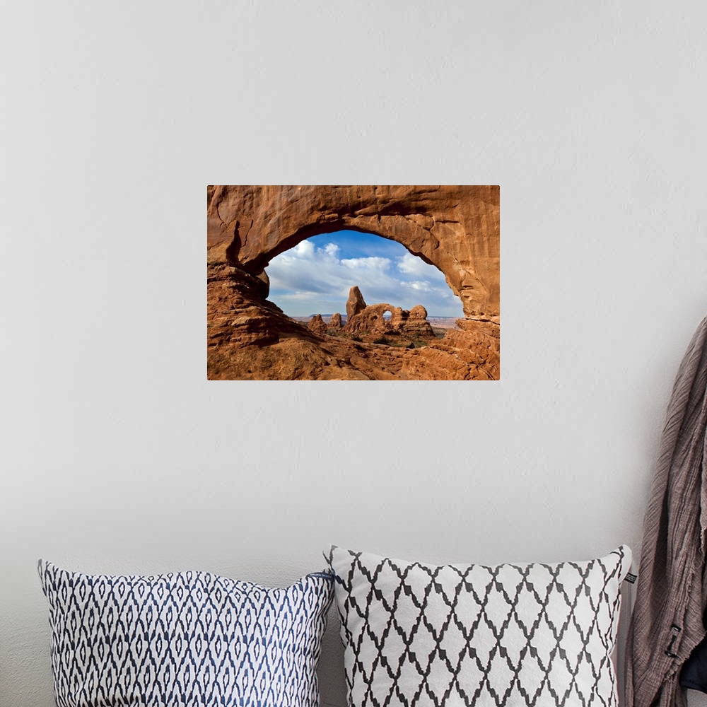 A bohemian room featuring Turret Arch through North Window Arch, Arches National Park, Utah.