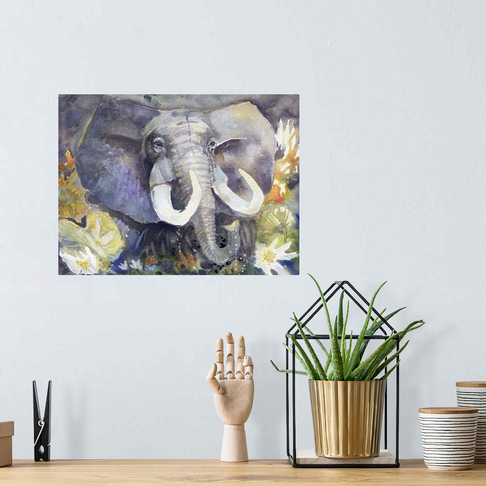 A bohemian room featuring Artwork of an African Elephant with large tusks surrounded by lotus flowers.