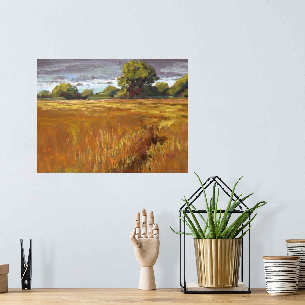 A bohemian room featuring Contemporary painting of golden field of grass in the countryside.