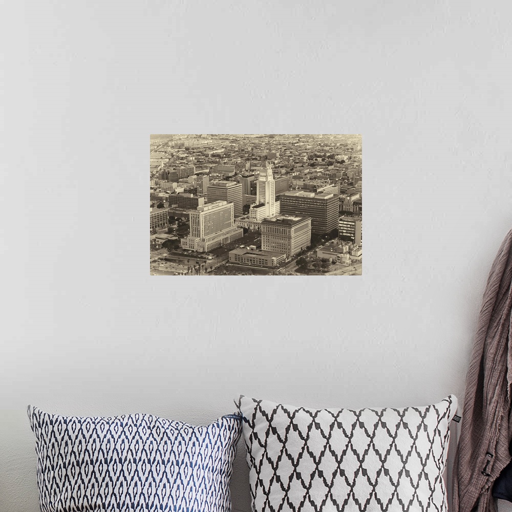 A bohemian room featuring Aerial vintage photograph of the downtown LA area.