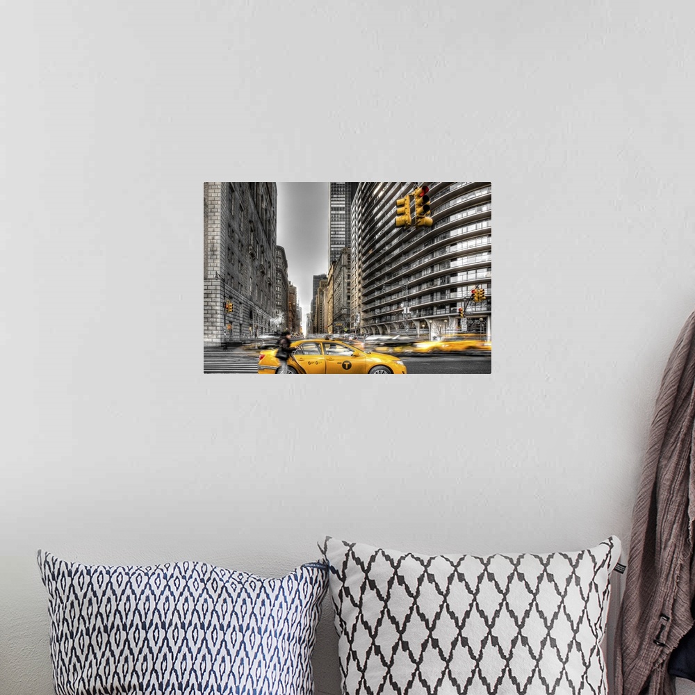 A bohemian room featuring HDR photograph of a stopped yellow taxi in New York city.
