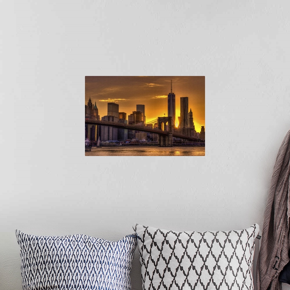 A bohemian room featuring A photograph of the NYC skyline at sunset.