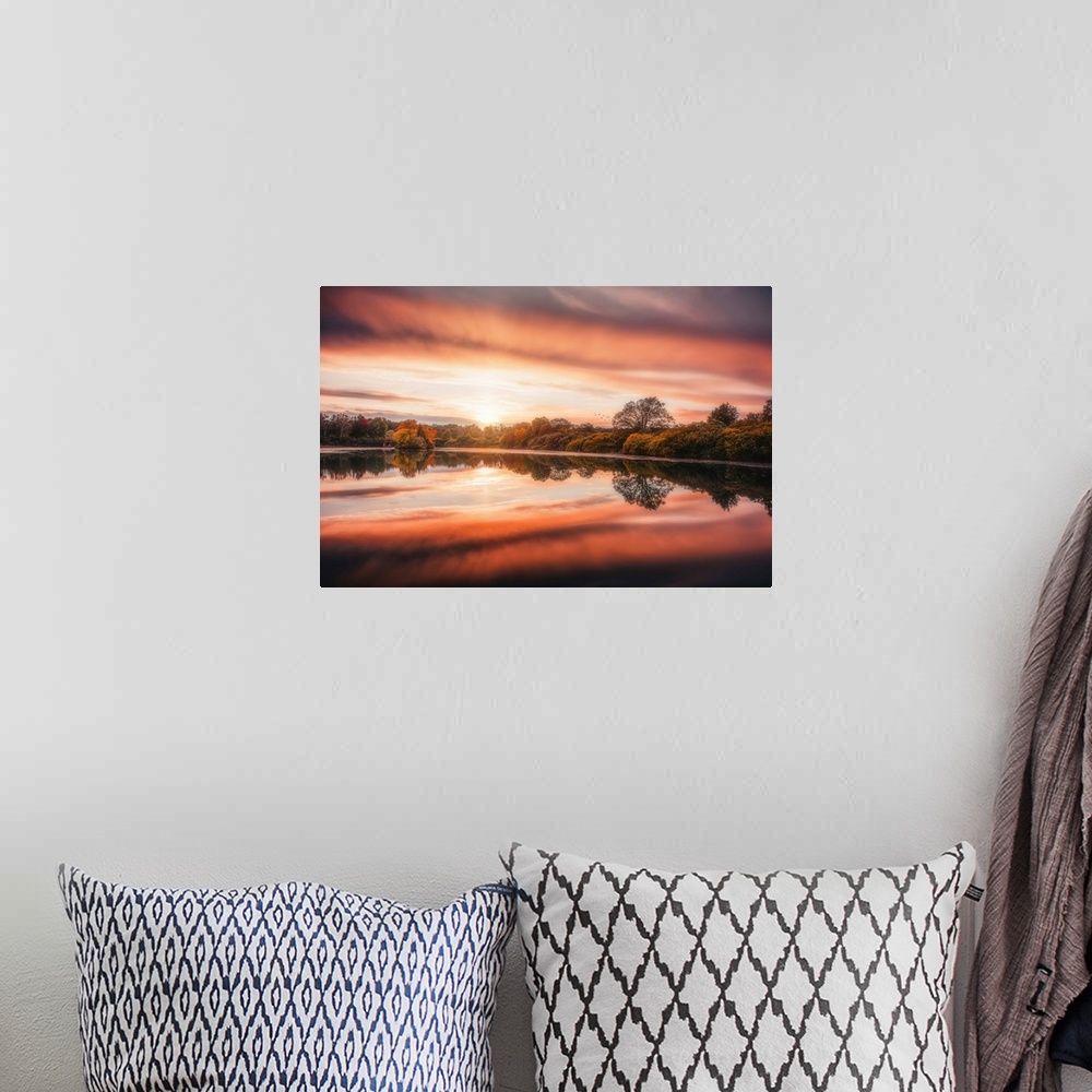 A bohemian room featuring Sunset over a lake in autumn with a beautiful reflection