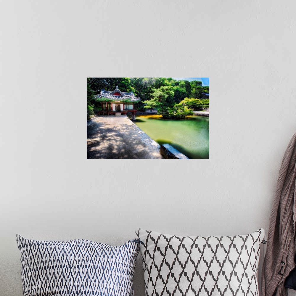 A bohemian room featuring Fine art photo of a pond and small building in a garden in South Korea.