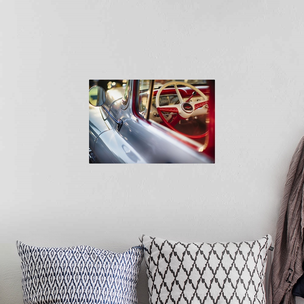 A bohemian room featuring A photograph of a vintage truck.