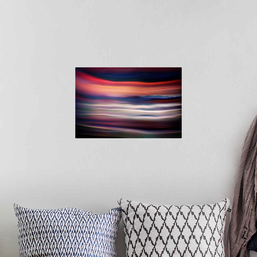 A bohemian room featuring Abstract photograph of blurred and blended colors and flowing lines.