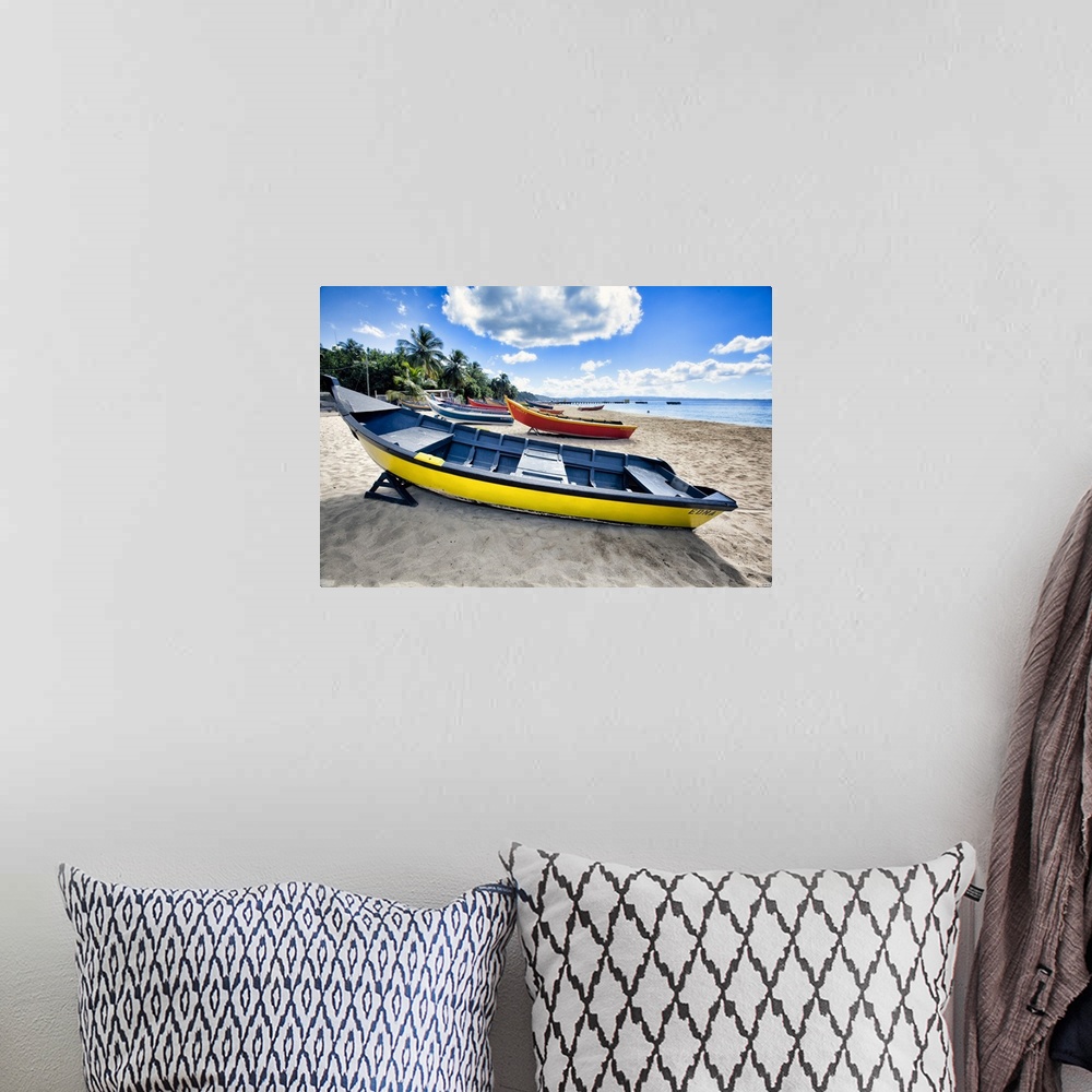 A bohemian room featuring Low angle view of colorful, small wooden, fishing boats on a Caribbean beach, Crash Boat Beach, A...