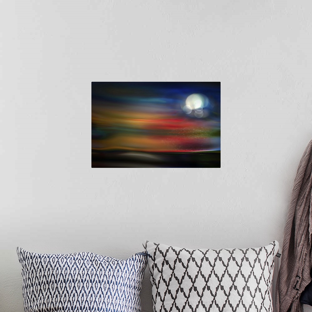 A bohemian room featuring Abstract photograph of blurred and blended colors and flowing lines with a glowing moon.