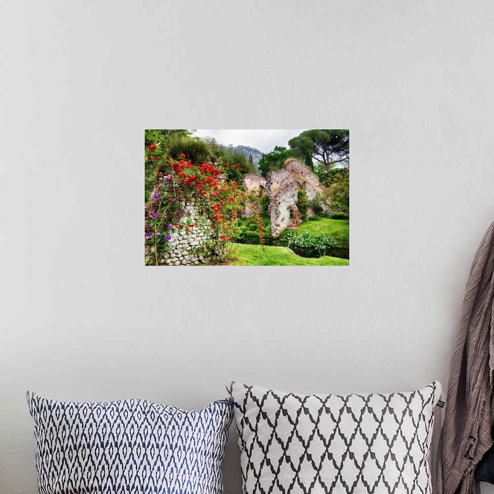 A bohemian room featuring Garden with historic ruins and blooming flowers, Latina, Italy.