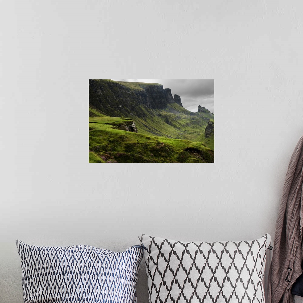 A bohemian room featuring Fine art photo of a misty valley surrounded by steep cliffs.