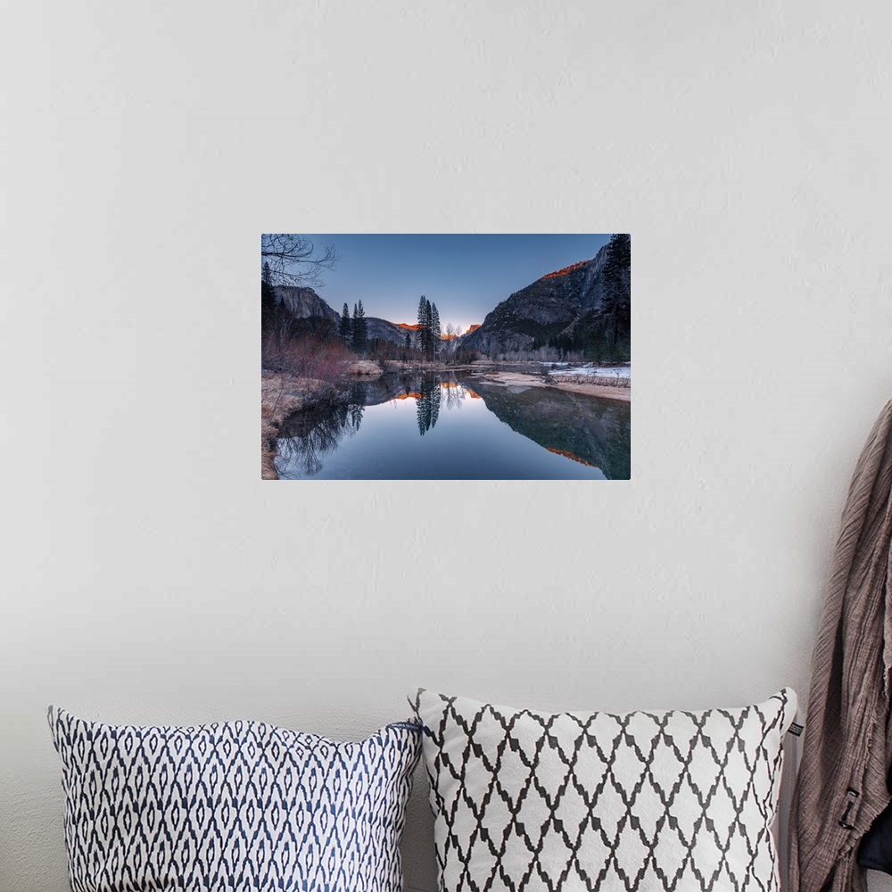 A bohemian room featuring Half Dome and its reflection in Merced River, Yosemite National Park, during golden hour of a sun...