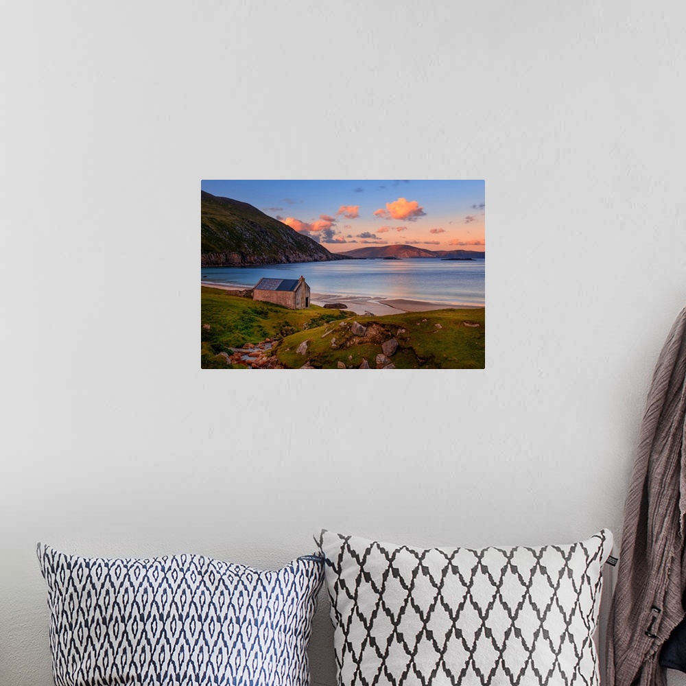 A bohemian room featuring Peaceful scene of a sunset on an Irish beach