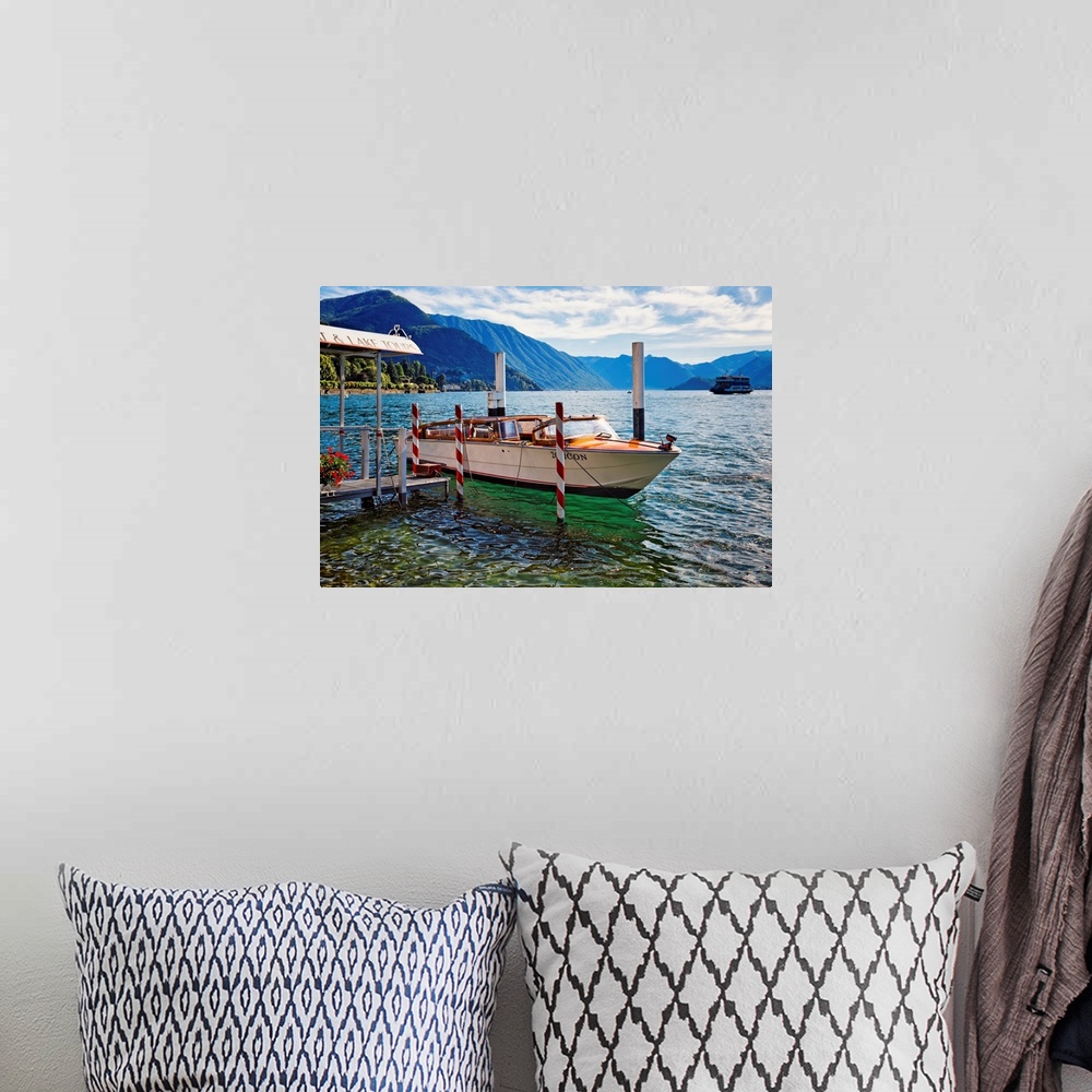 A bohemian room featuring Fine art photo of a boat at the dock in a lake in Como, Italy.