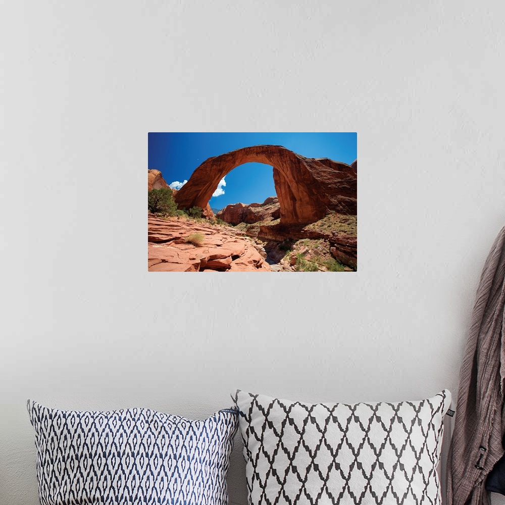 A bohemian room featuring Low angle view of a Natural Arch, Rainbow Bridge, Utah.