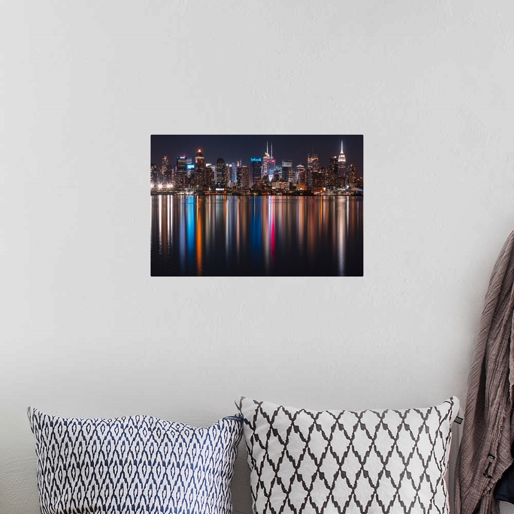 A bohemian room featuring Long exposure of Manhattan, NYC and its rainbow reflection in the Hudson River.