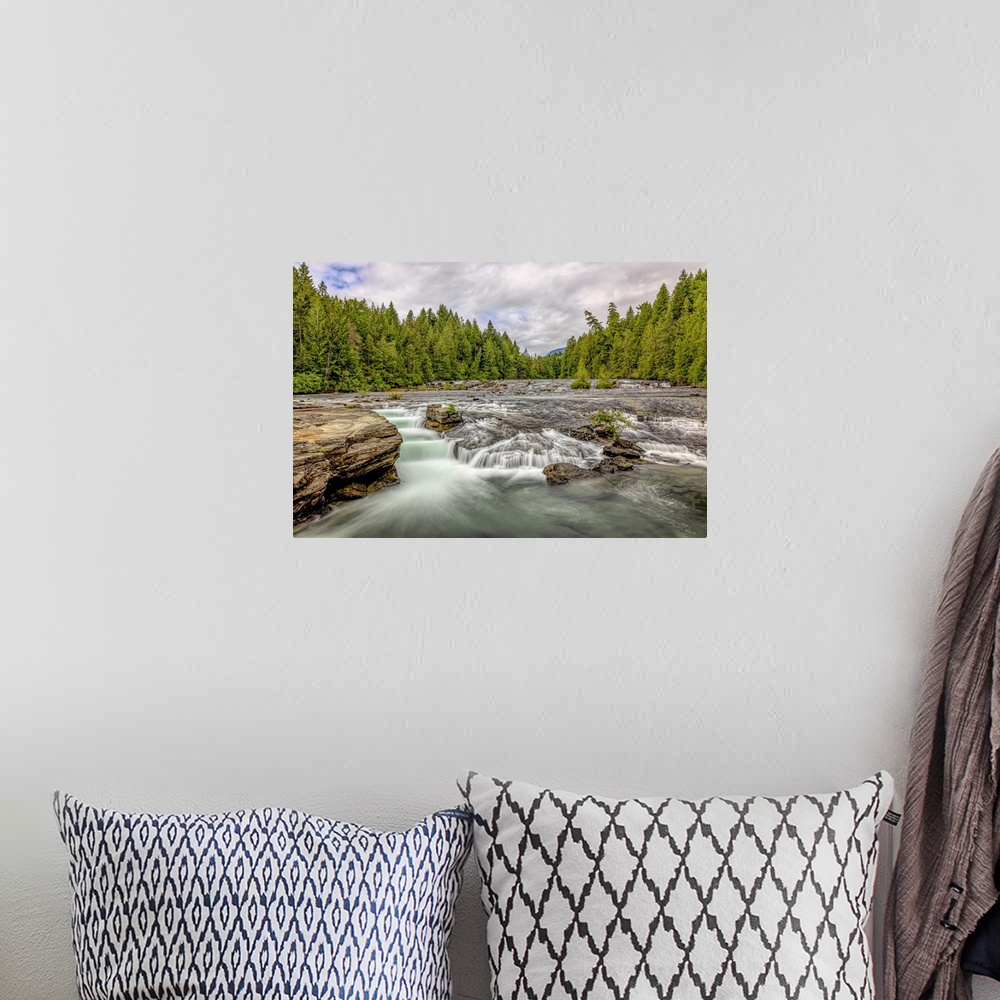 A bohemian room featuring Long exposure of Nymph Falls on Vancouver Island.