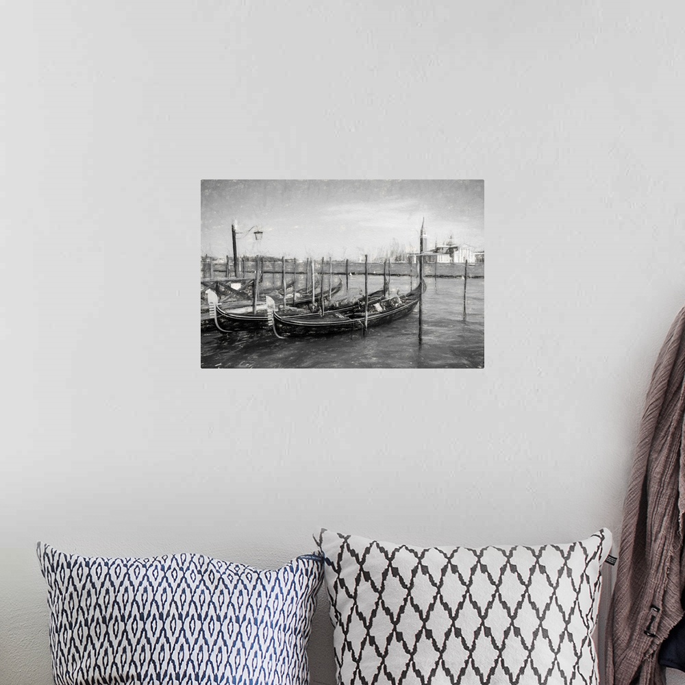 A bohemian room featuring Fine art photo of gondolas at a dock in Venice, Italy, in black and white.