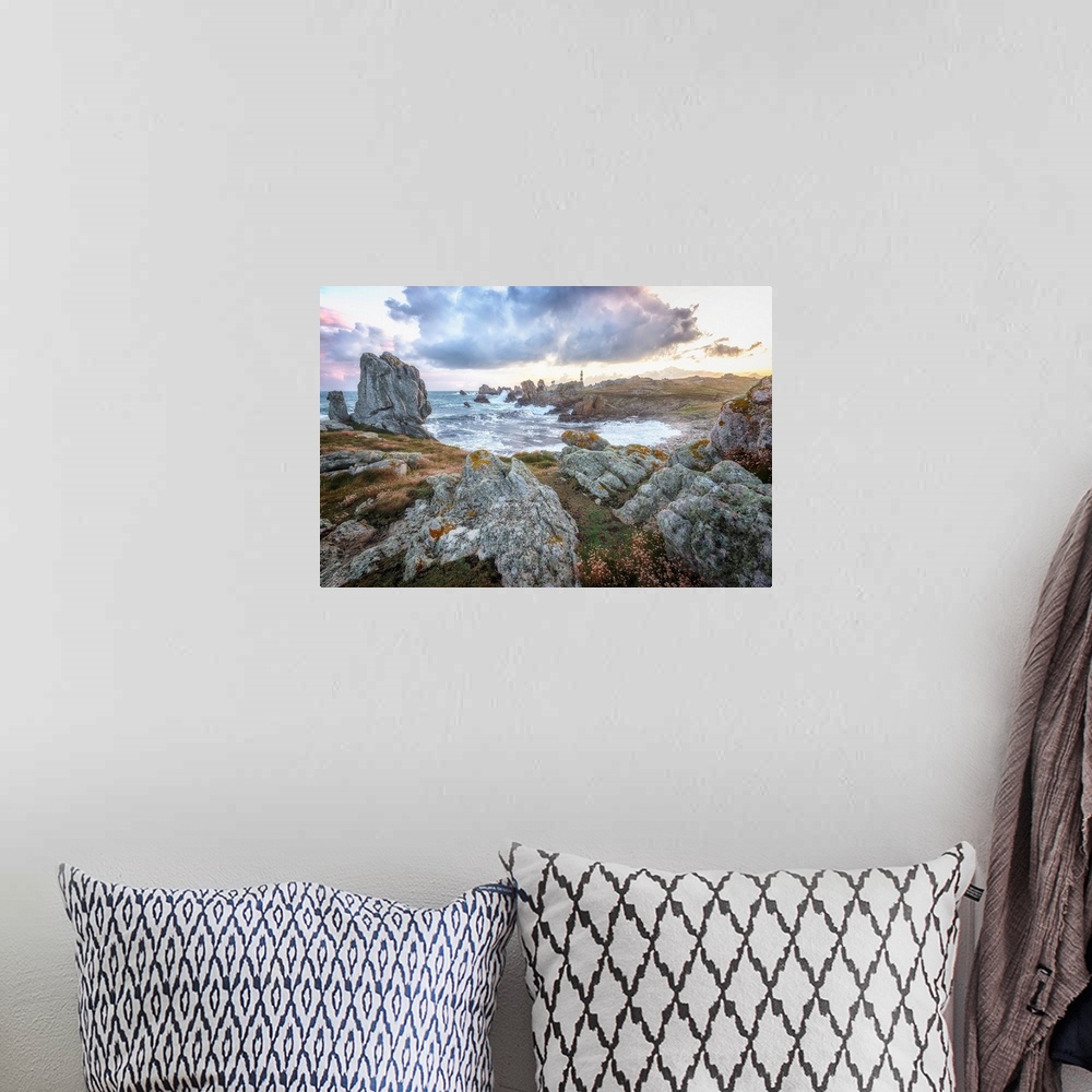 A bohemian room featuring Fine art photo of a lighthouse on a rocky shore in the north of France.