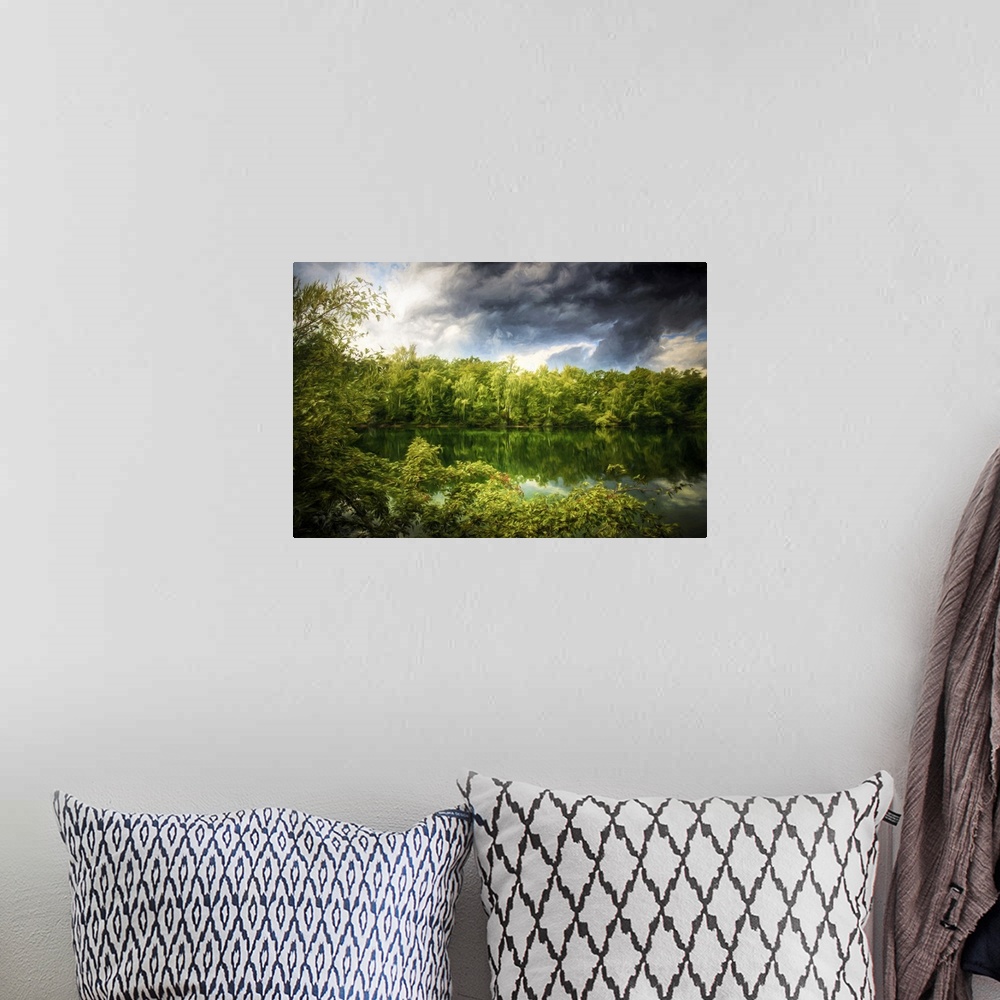 A bohemian room featuring Photo Expressionism - Green forest around a lake under big clouds.