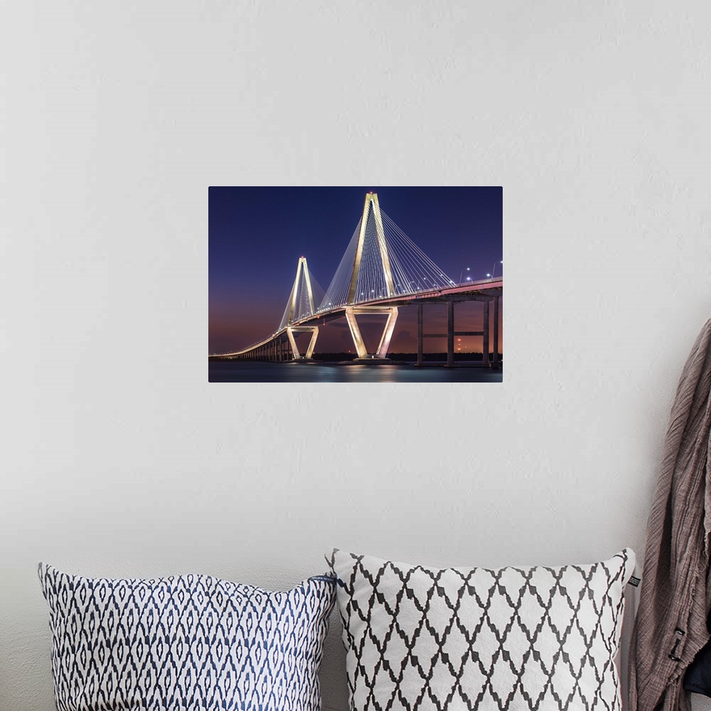 A bohemian room featuring White towers and cables of the Cooper River Bridge in Charleston, South Carolina, at sunset.