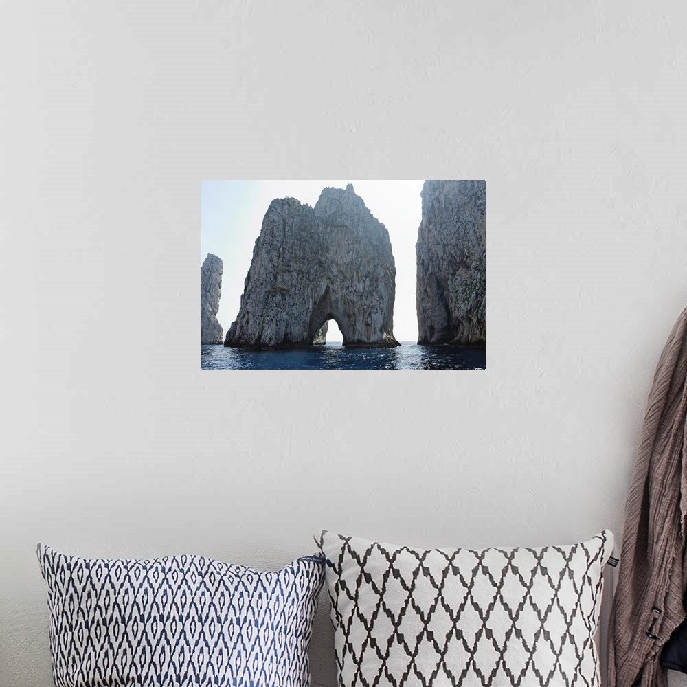 A bohemian room featuring Close up View of Rocks in the Sea, Faraglioni, Capri, Bay of Naples, Campania, Italy.