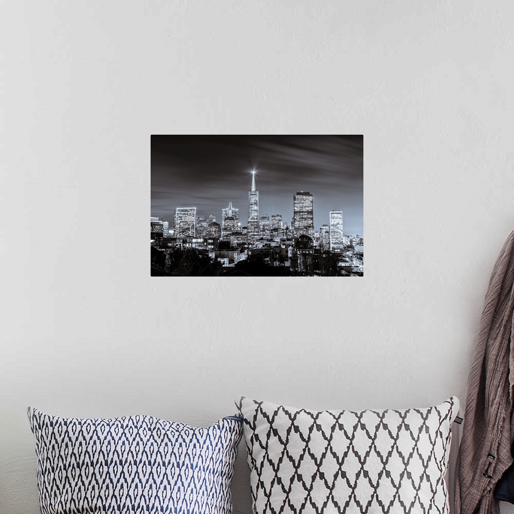 A bohemian room featuring A black and white long exposure image of the skyline of financial district in San Francisco.