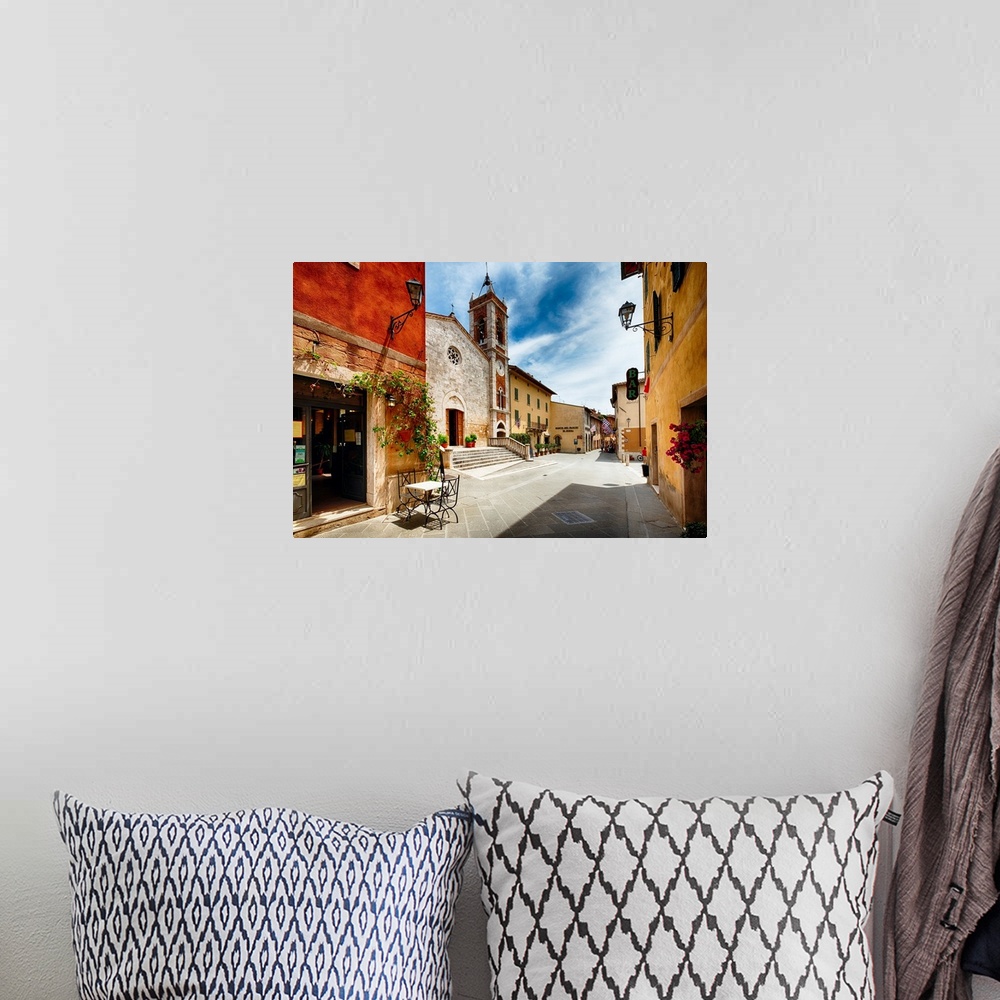 A bohemian room featuring Street with a Catholic Church, San Quirico, Tuscany, Italy.