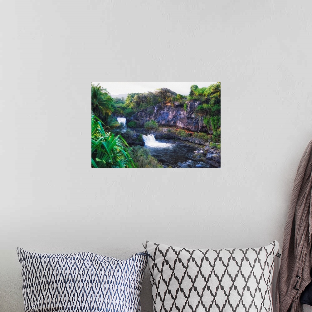 A bohemian room featuring High angle view of the Waterfalls of the Seven Sacred Pools, Hana Road, Maui, Hawaii.