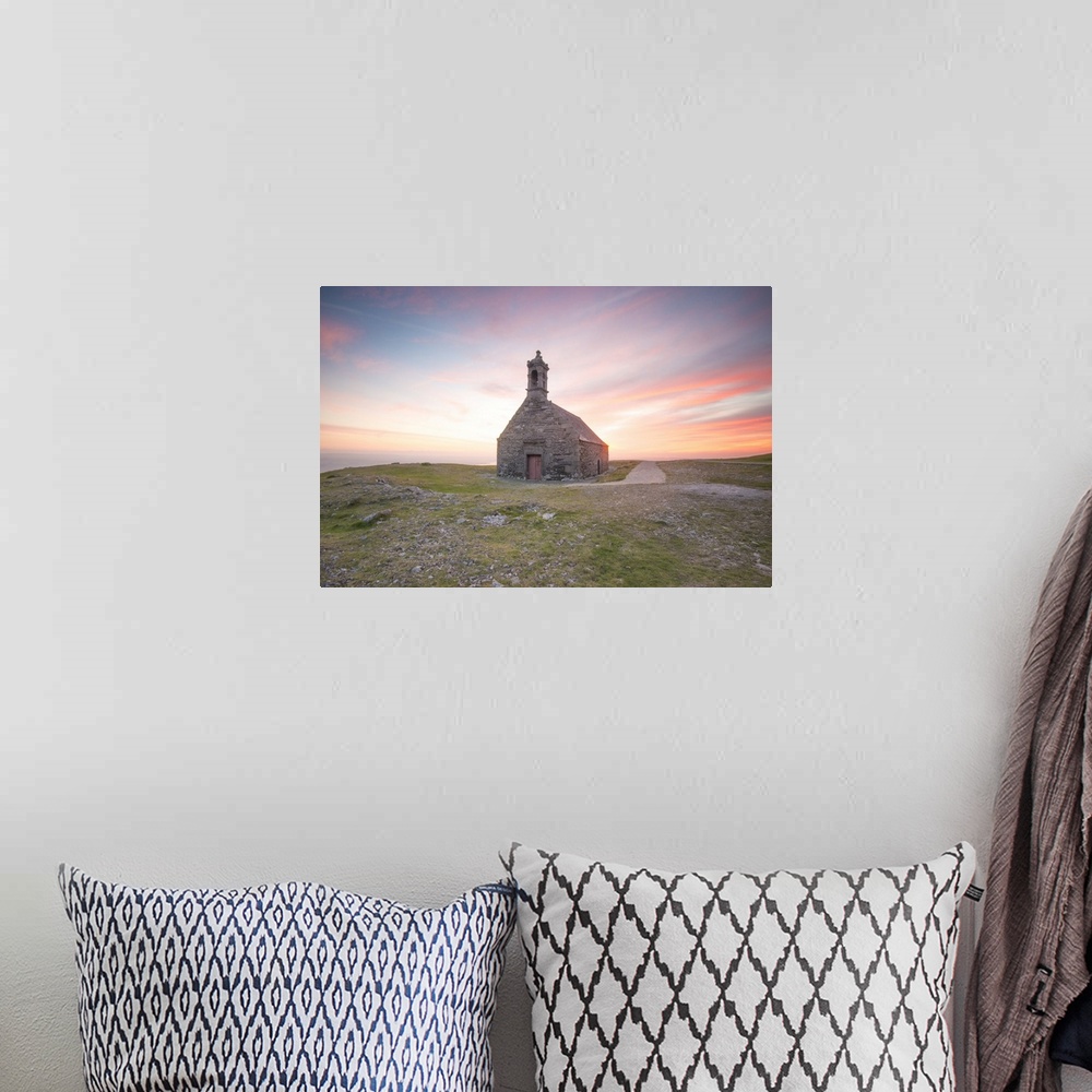 A bohemian room featuring Pink sweet sunset in Brittany, on little Saint Michel chapel.