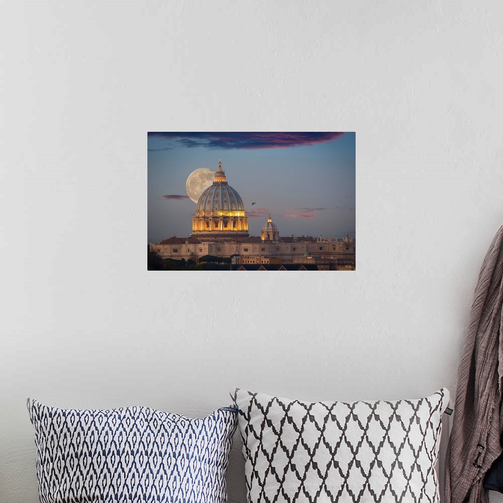 A bohemian room featuring Fine art photograph of the moon rising right behind St. Peter's Basilica in Rome.