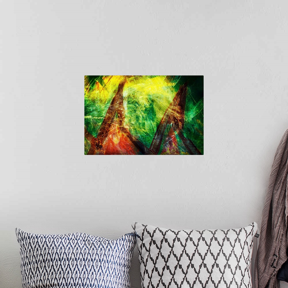 A bohemian room featuring Abstract image resembling two tepees in green, yellow, brown, and red hues.