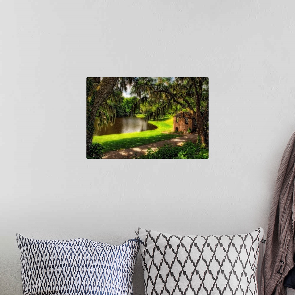 A bohemian room featuring Fine art photo of a small house near a river in a mossy forest in South Carolina.