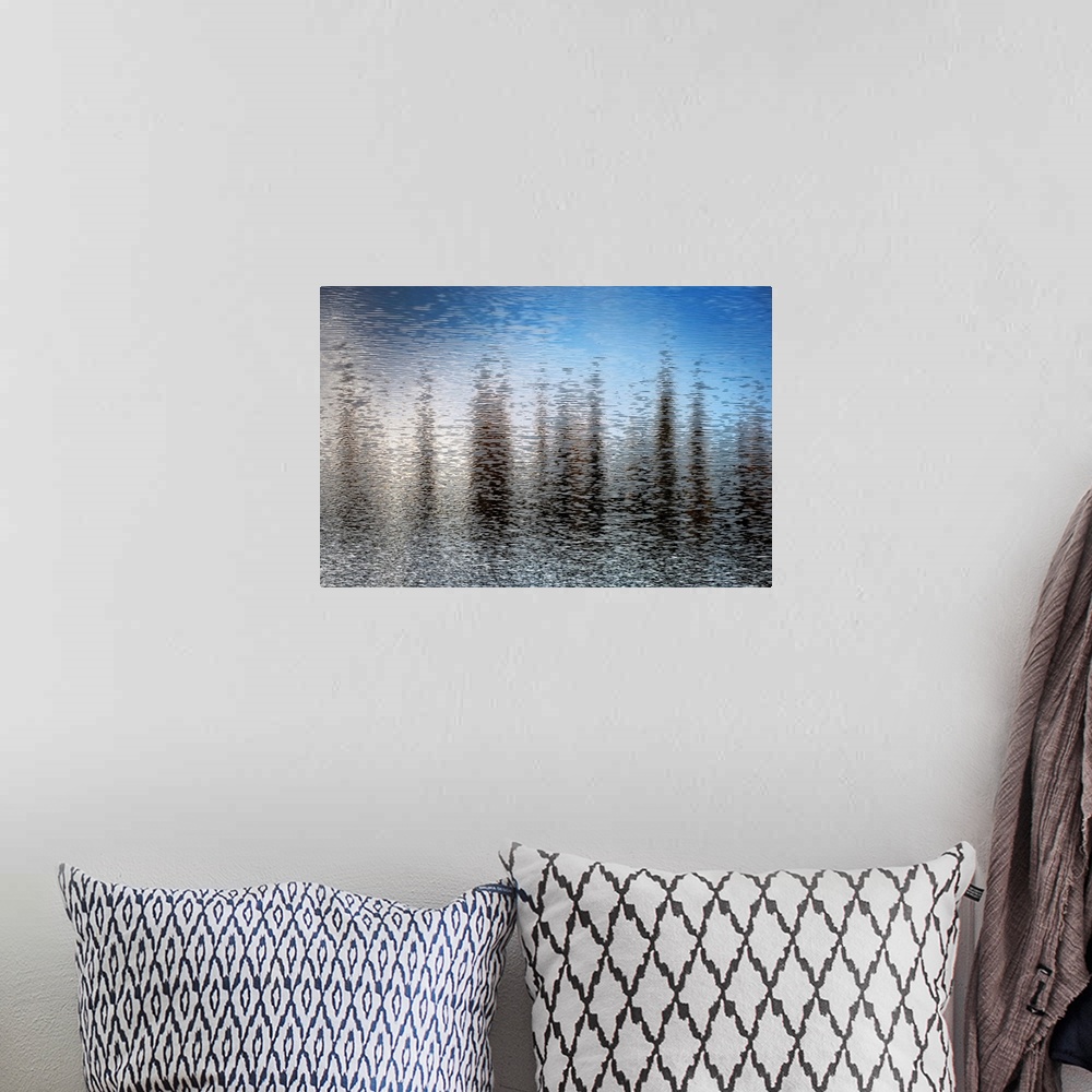 A bohemian room featuring Fine art photo of abstract shapes reflected in the rippling water of a lake.