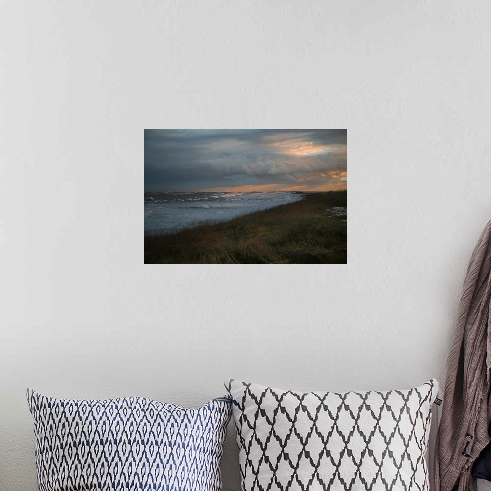 A bohemian room featuring Long exposure photograph of and ocean view with the warm setting sun.