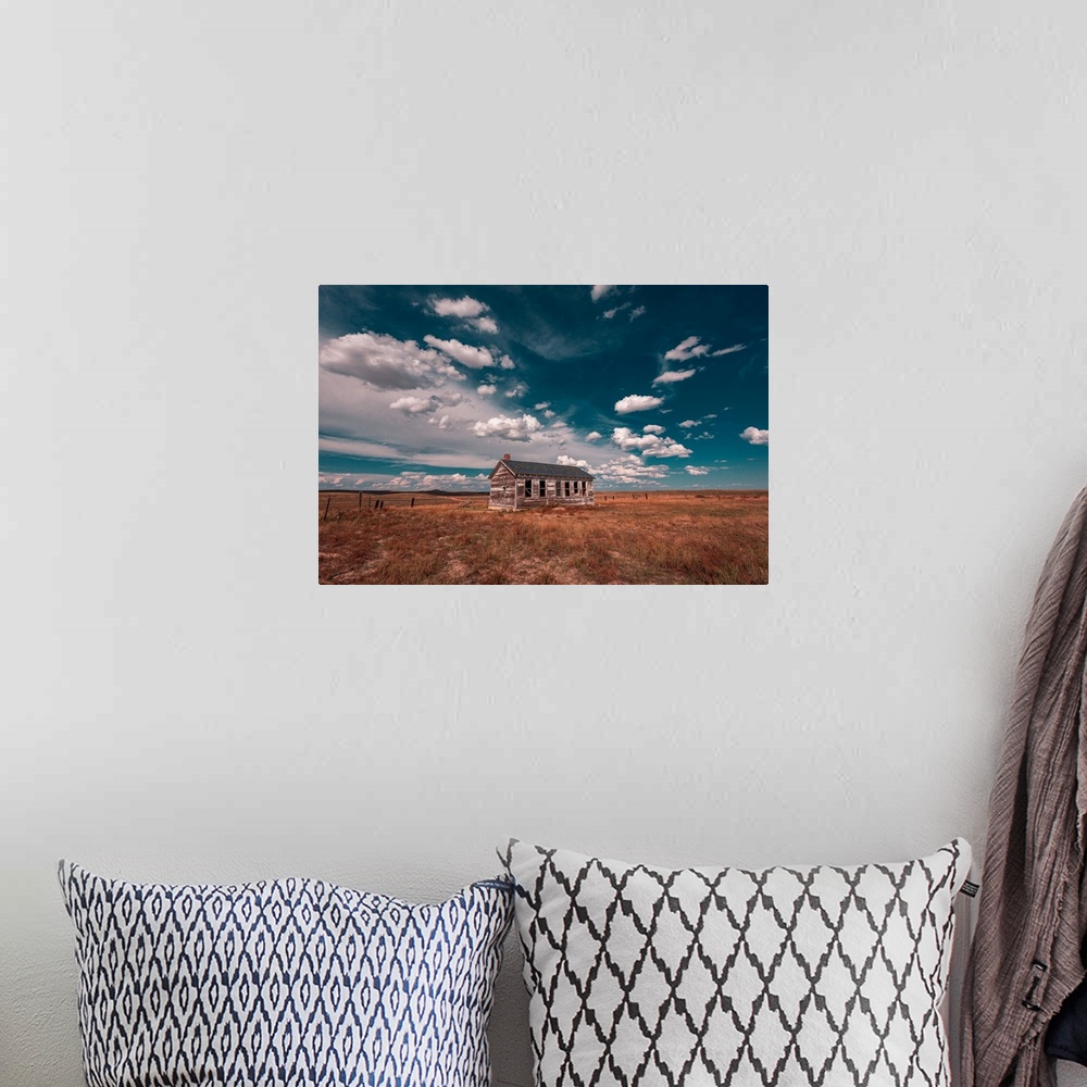 A bohemian room featuring Beautiful clouds over lone house at Thunder Basin National Grassland, Wyoming