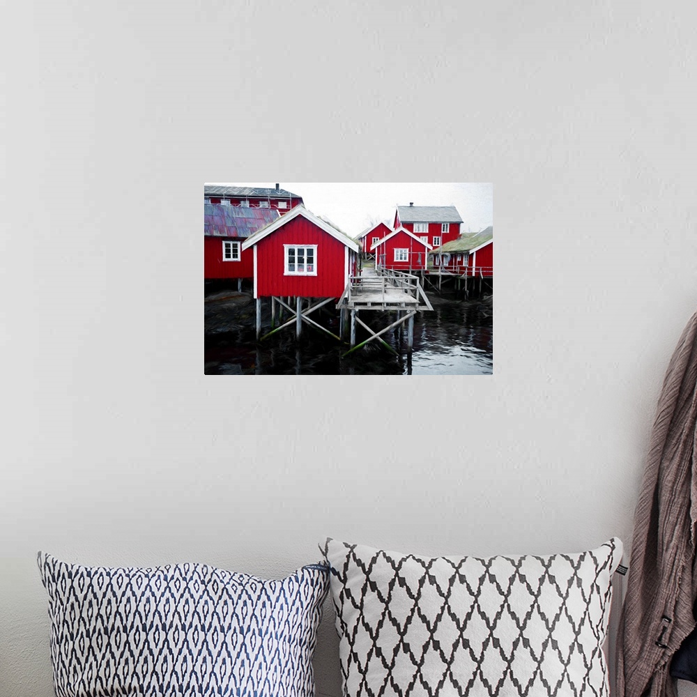 A bohemian room featuring A photograph of a red building village.