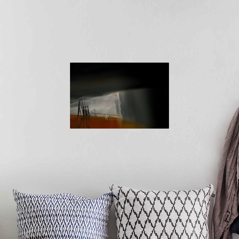 A bohemian room featuring Abstract photograph in black, red, gold, and gray.