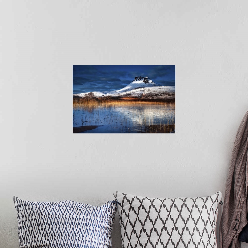 A bohemian room featuring Dramatic snow on mountains in winter in the Scottish Highlands.