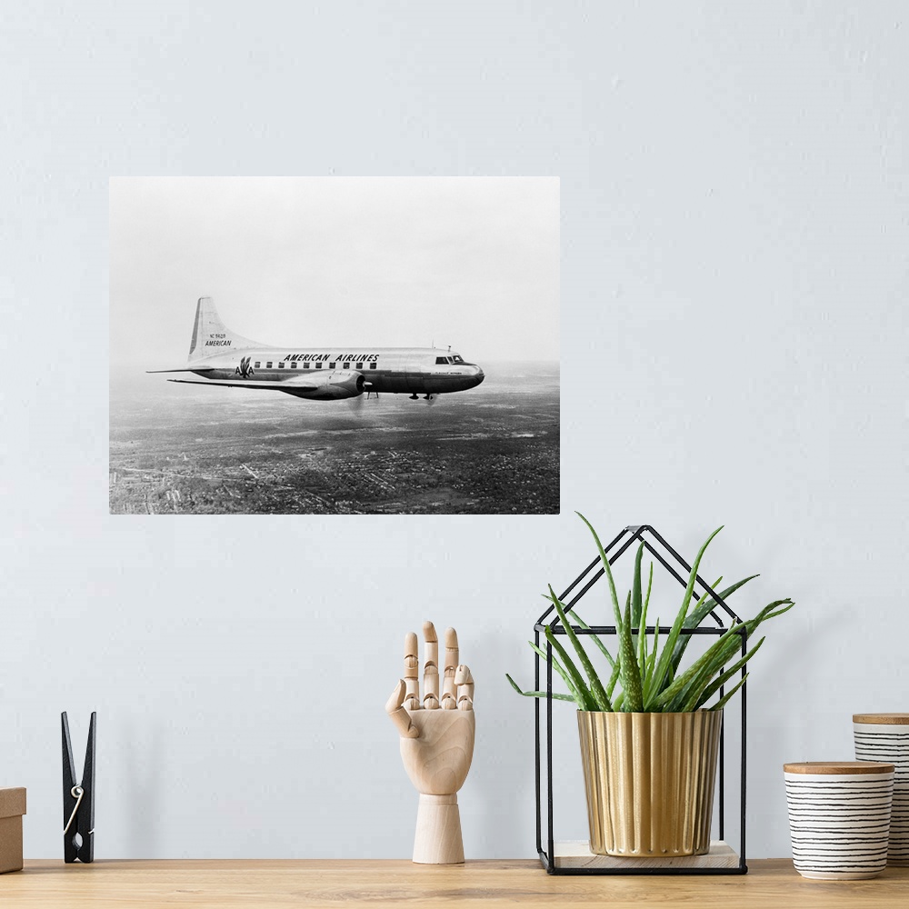 A bohemian room featuring 1950's American Airlines Convair Flagship Propeller Aircraft In Flight
