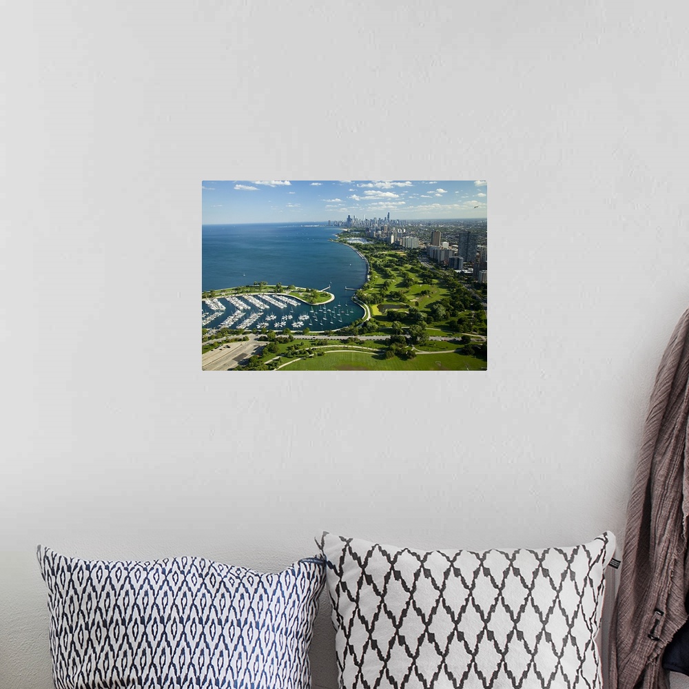 A bohemian room featuring This high angle photograph is taken from a distance of Chicago and most of the lake shown to the ...