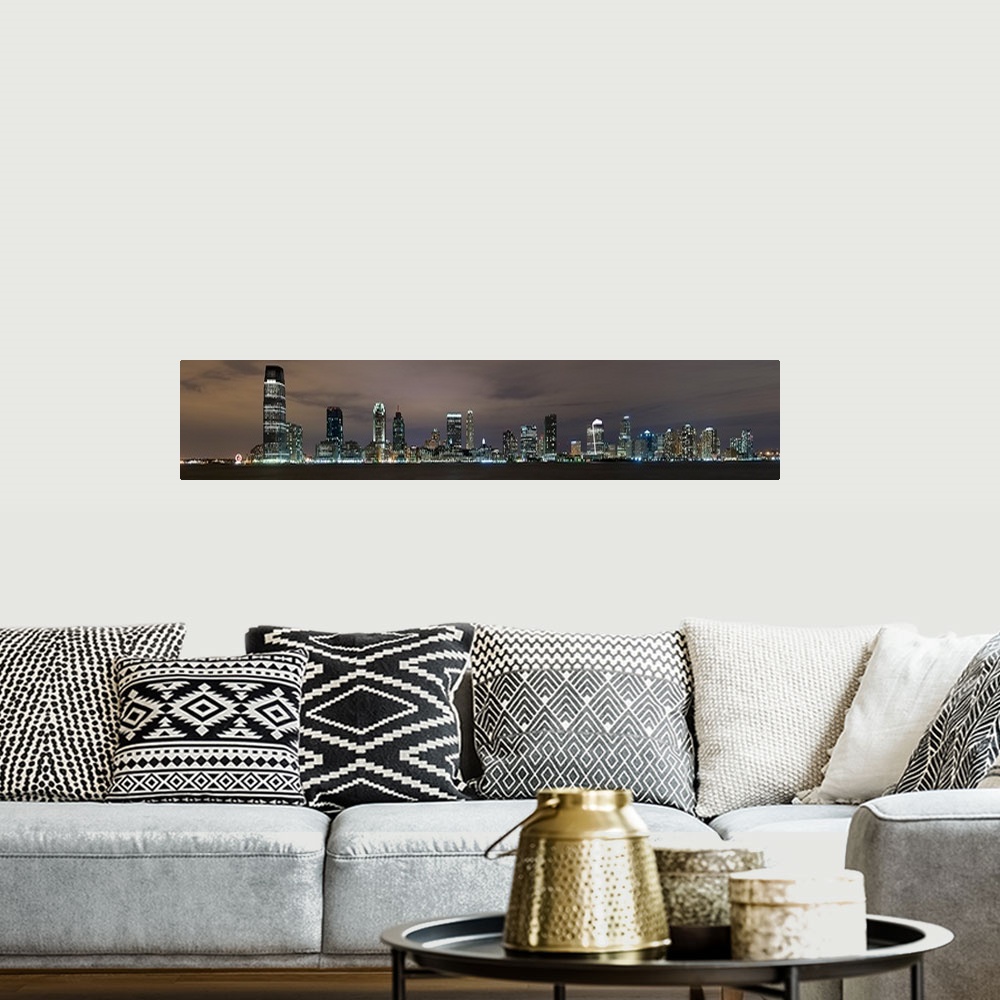 A bohemian room featuring Buildings in a city lit up at night, Hudson River, Jersey City, Hudson County, New Jersey,