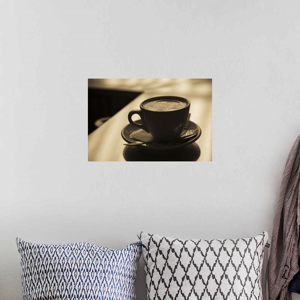 A bohemian room featuring Close up of a cup of cappuccino, Lugano, Lake Lugano, Ticino, Switzerland