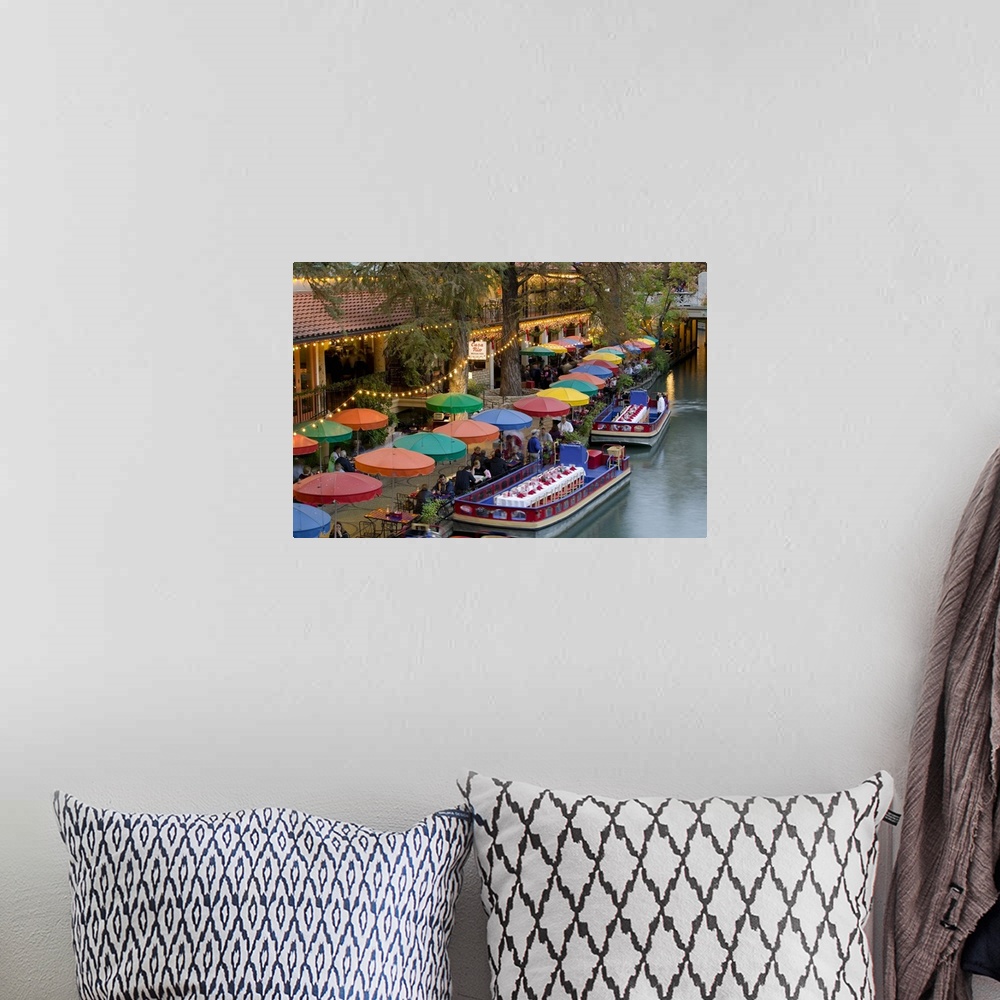 A bohemian room featuring Large photo on canvas of colored umbrellas along a waterfront with boats with tables and chairs d...