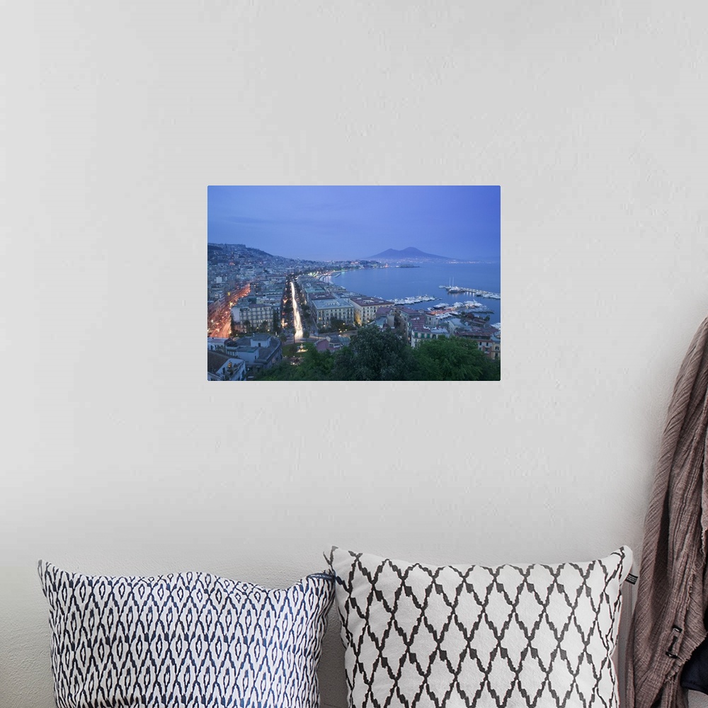 A bohemian room featuring High angle view of a city at dusk, Mt Vesuvius, Naples, Campania, Italy