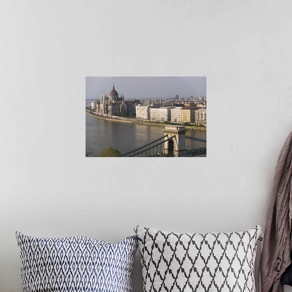 A bohemian room featuring High angle view of buildings at the waterfront, Parliament Building, Chain Bridge, Danube River, ...