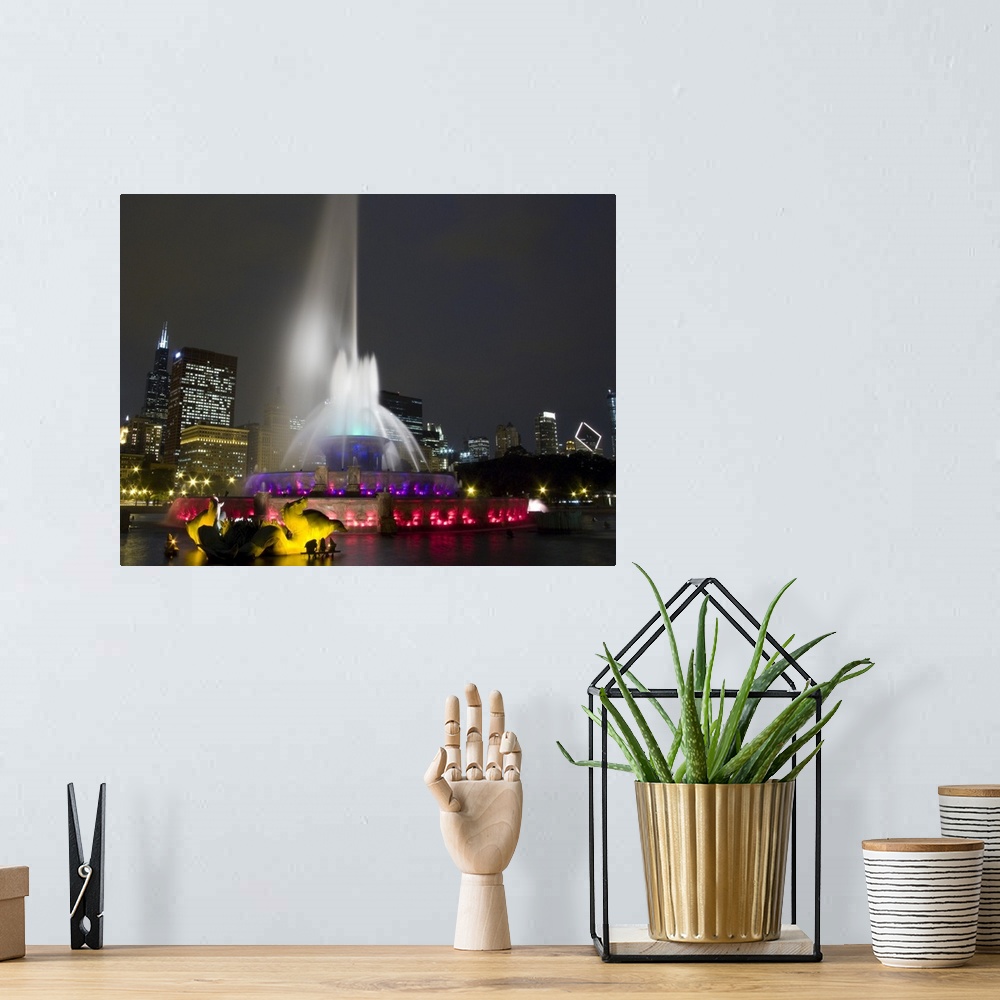 A bohemian room featuring Illuminated fountain with skyscrapers in a city, Buckingham Fountain, Grant Park, Chicago, Illinois,