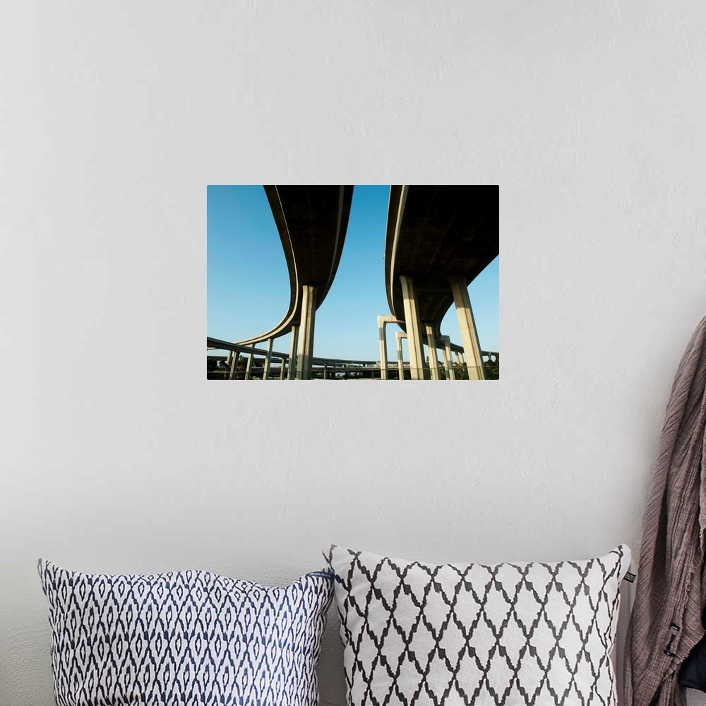 A bohemian room featuring Low angle view of overpasses, Interstate 105, Los Angeles, California II