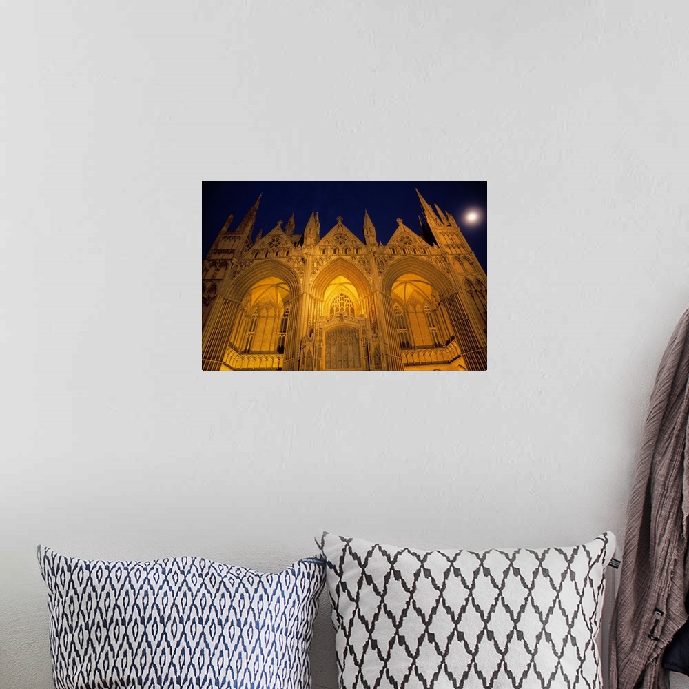 A bohemian room featuring Low-angle view of Peterborough Cathedral illuminated at night, Peterborough, England.