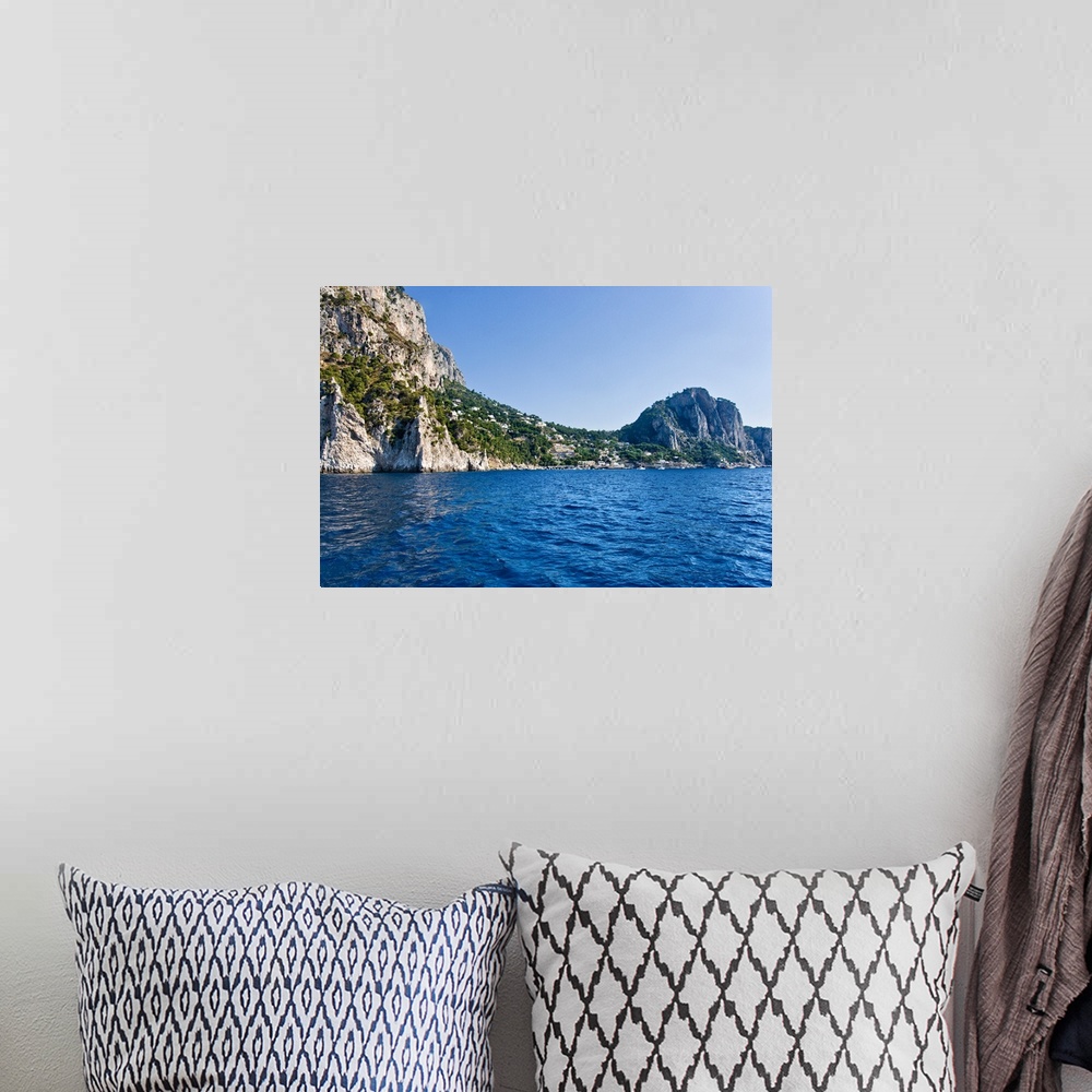 A bohemian room featuring Rock formations in the sea Capri Naples Campania Italy